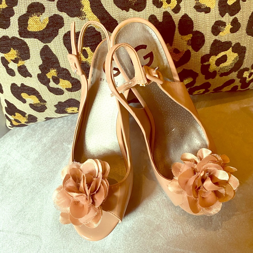 Guess platforms with 4 inch heel.